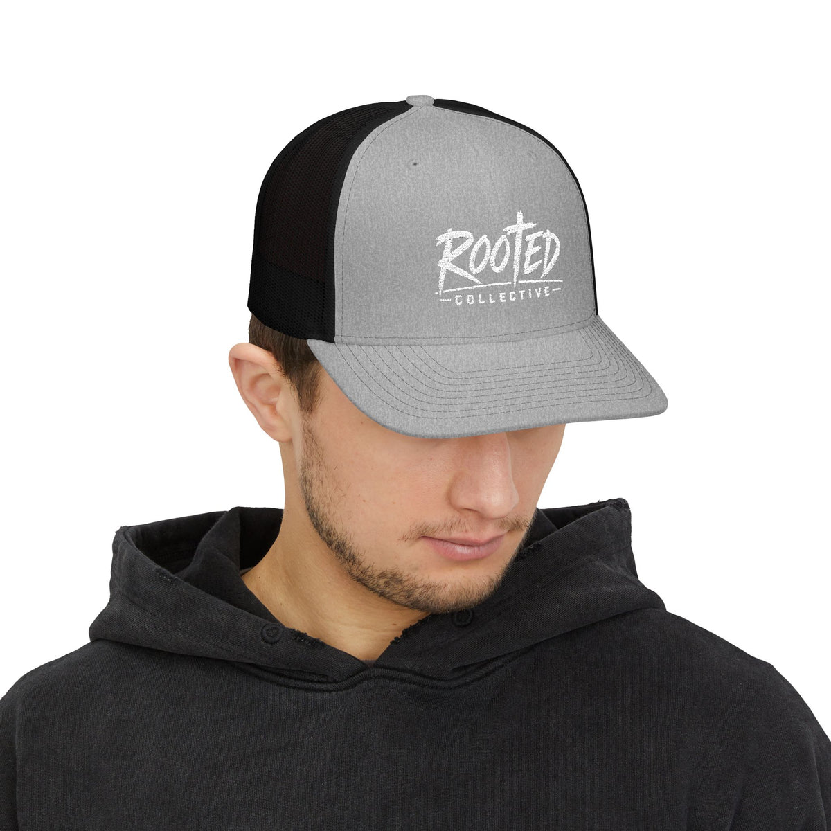 THE ROOTED COLLECTIVE TRUCKER CAP