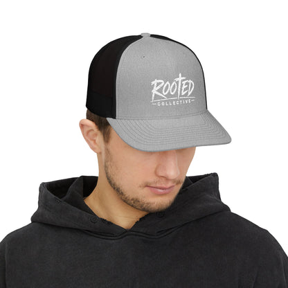 THE ROOTED COLLECTIVE TRUCKER CAP