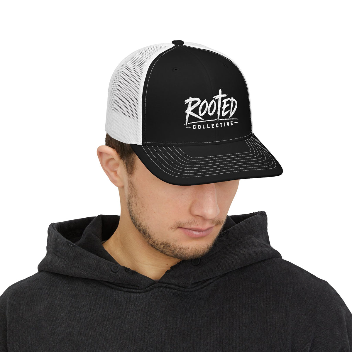 THE ROOTED COLLECTIVE TRUCKER CAP