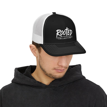 THE ROOTED COLLECTIVE TRUCKER CAP