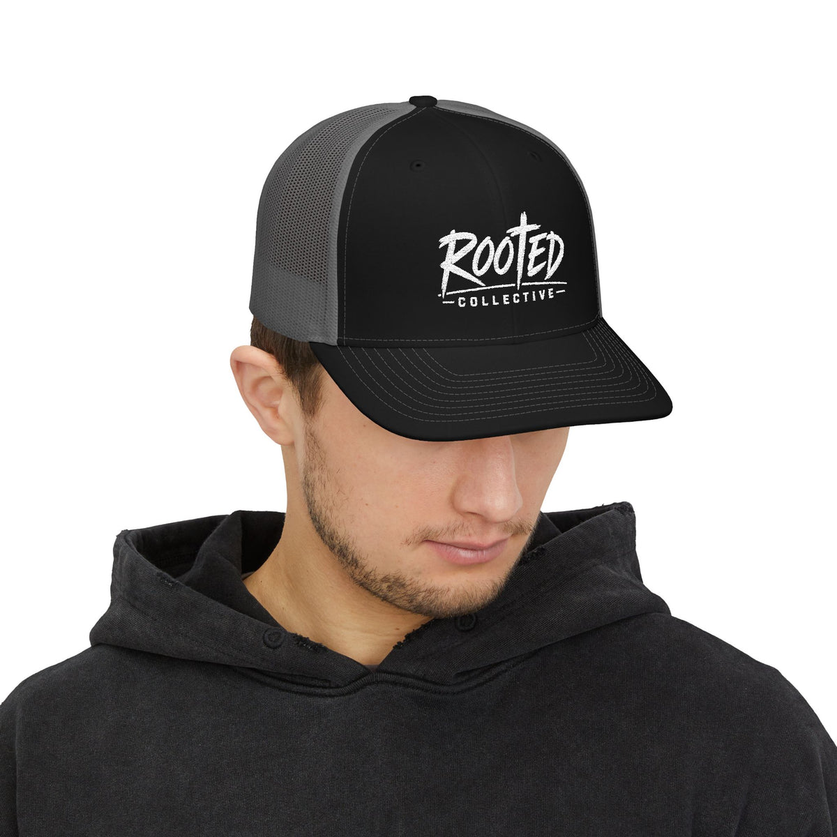THE ROOTED COLLECTIVE TRUCKER CAP