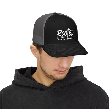 THE ROOTED COLLECTIVE TRUCKER CAP