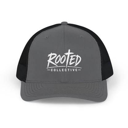 THE ROOTED COLLECTIVE TRUCKER CAP