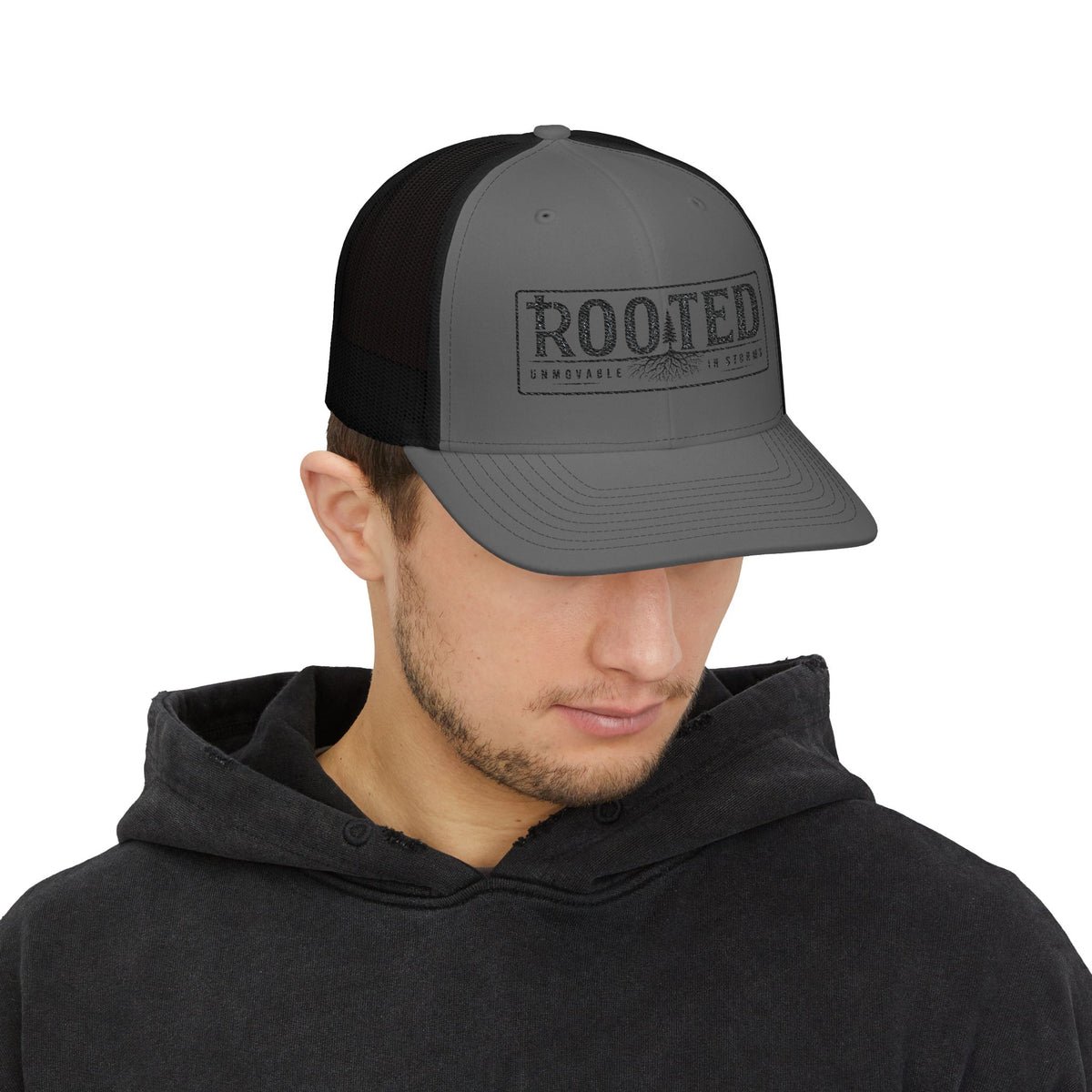 UNMOVABLE IN STORMS TRUCKER CAP