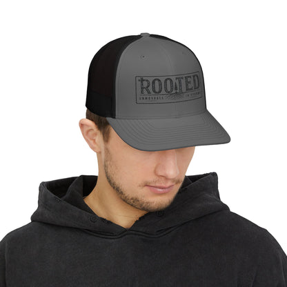UNMOVABLE IN STORMS TRUCKER CAP