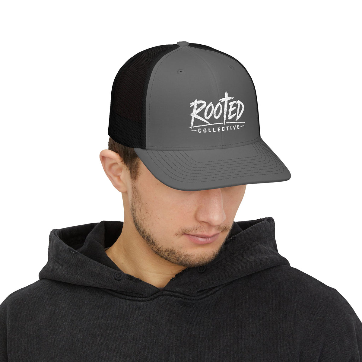 THE ROOTED COLLECTIVE TRUCKER CAP