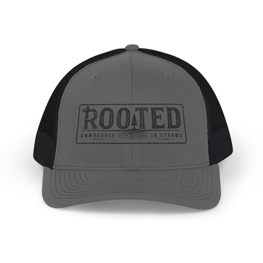 UNMOVABLE IN STORMS TRUCKER CAP