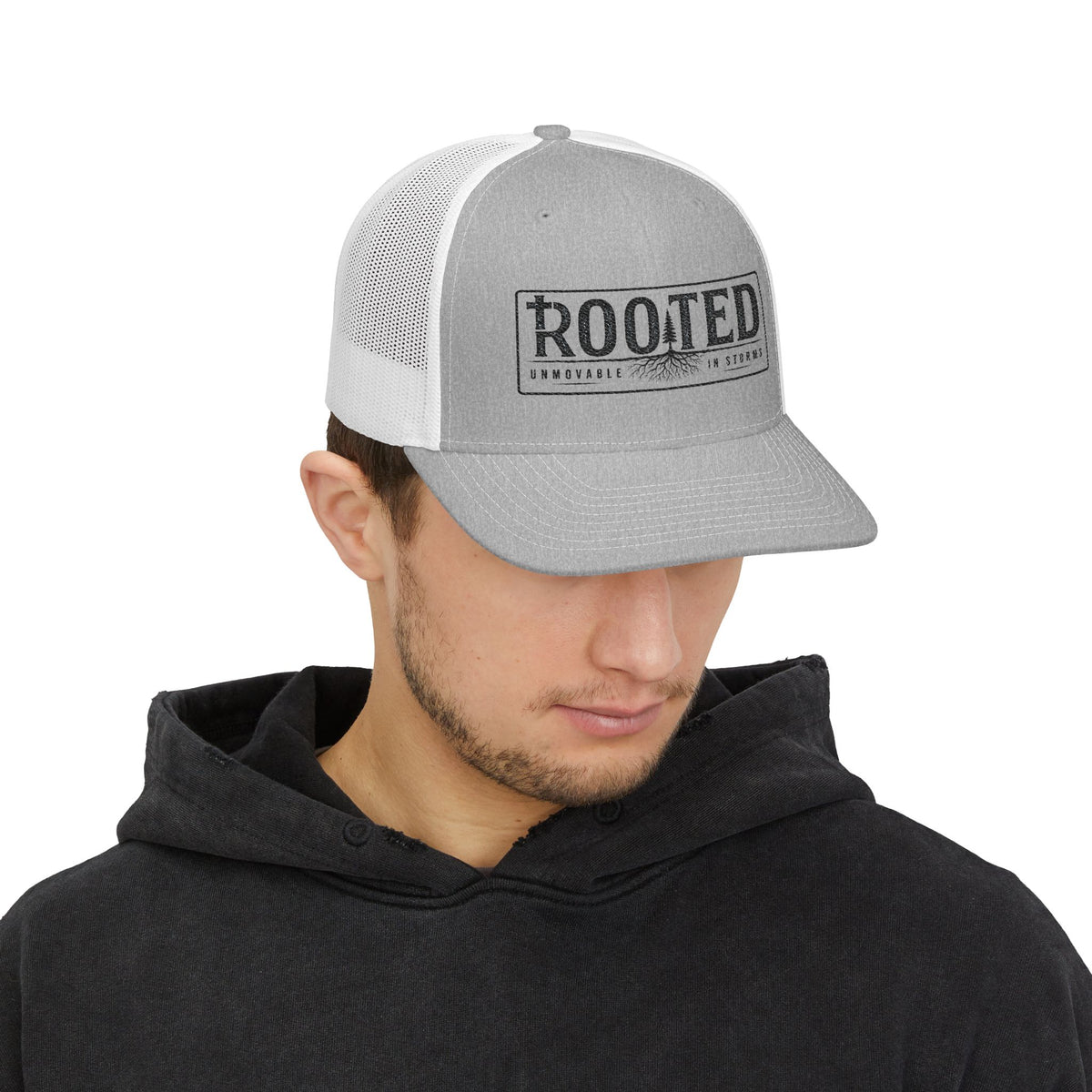 UNMOVABLE IN STORMS TRUCKER CAP
