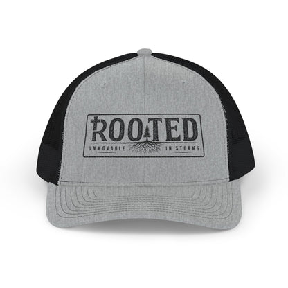 UNMOVABLE IN STORMS TRUCKER CAP