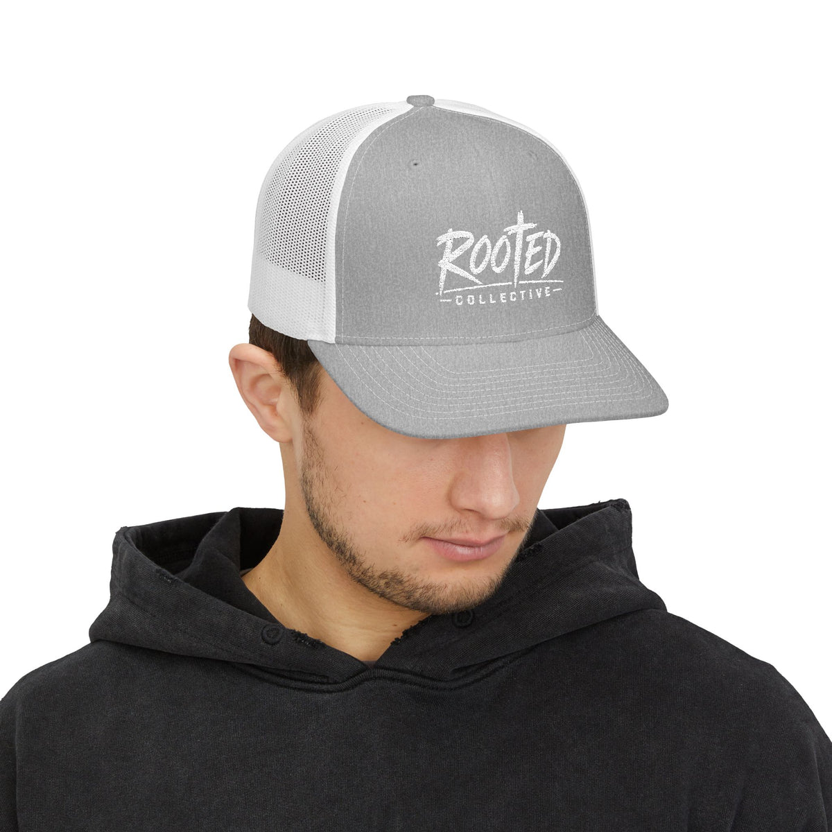 THE ROOTED COLLECTIVE TRUCKER CAP