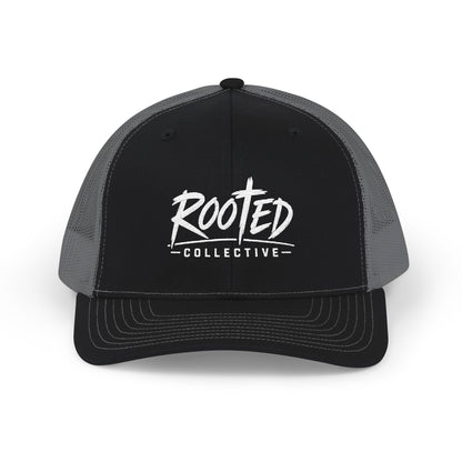 THE ROOTED COLLECTIVE TRUCKER CAP